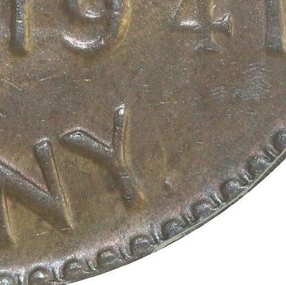 Dot mint-mark located on a 1941-Y Penny.