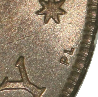 London 'PL' mint-mark on the reverse of a 1951-PL Half Penny.