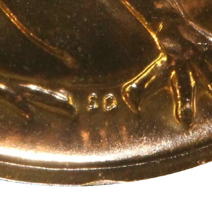 The initials of the designer, Stuart Devlin (SD), on a 2006 Two Cent piece. 