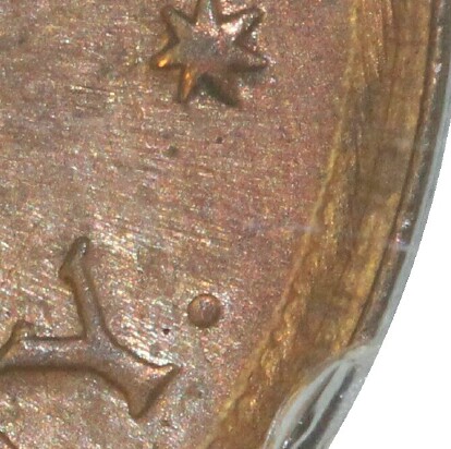 Perth dot mint-mark on the reverse of a 1951-Y Half Penny.