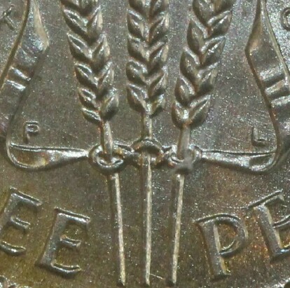 'PL' mint-mark on a 1951-PL Threepence.