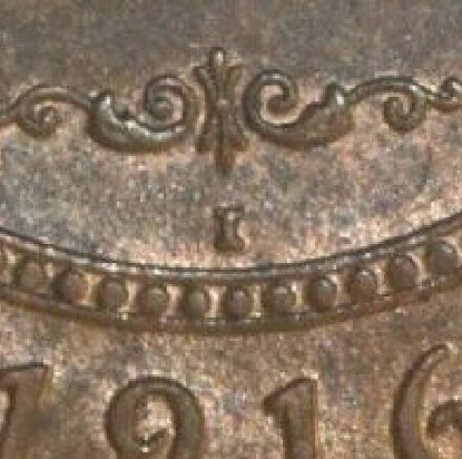 India 'I' mint-mark on the reverse of a 1916-I Penny.