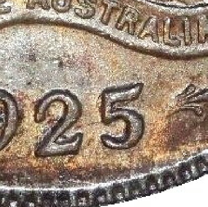 Signs of the 3 overdate on a 1925/3 Overdate Shilling.