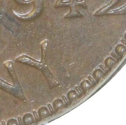 Dot mint-mark on the reverse of a 1942-Y Penny.