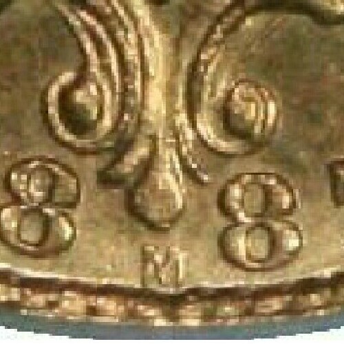 Reverse: Melbourne Mint 'M' mintmark directly below the shield